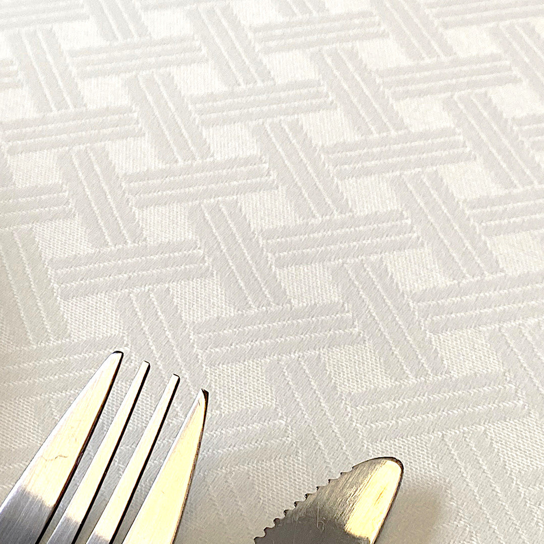 Benlliure Blanco – jacquardgewebte abwaschbare Tischdecke mit Flechtmuster, Nahaufnahme