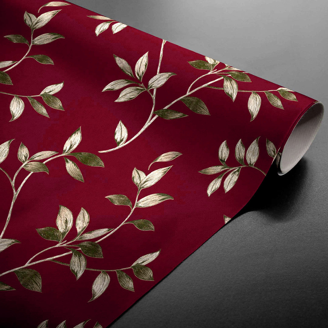 Liane Rouge – Wachstuch Tischdecke in Bordeaux mit goldenen Blattranken, aufgerollt