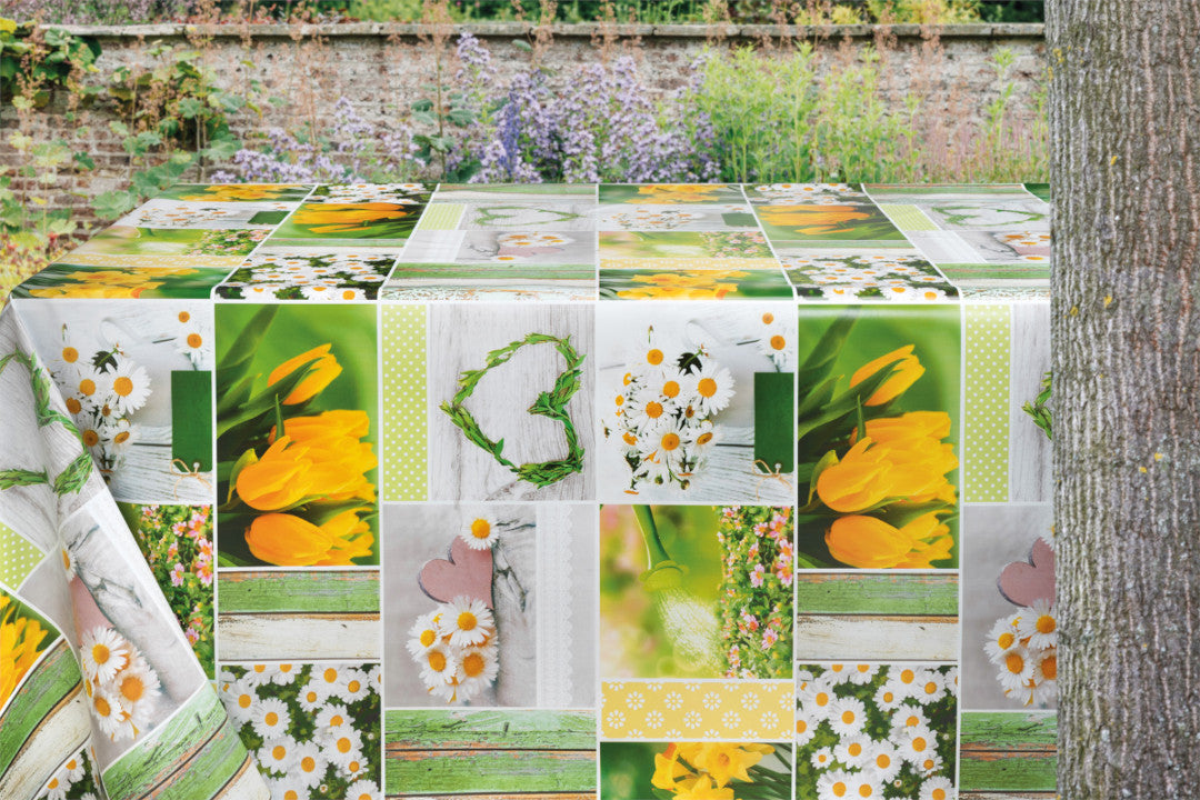 Frühling in Sicht – Wachstuch Tischdecke mit weißen Margeriten, gelben Tulpen und Narzissen