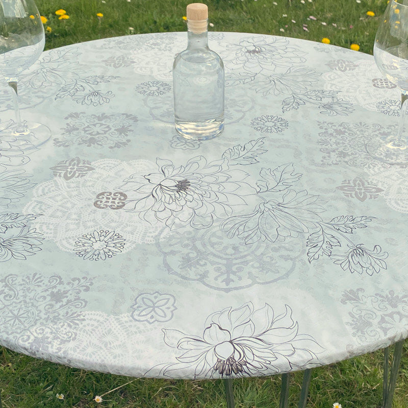 Schöne Blumen im Linienmuster in hellen Farben - Runde Wachstischdecke mit Gummizug
