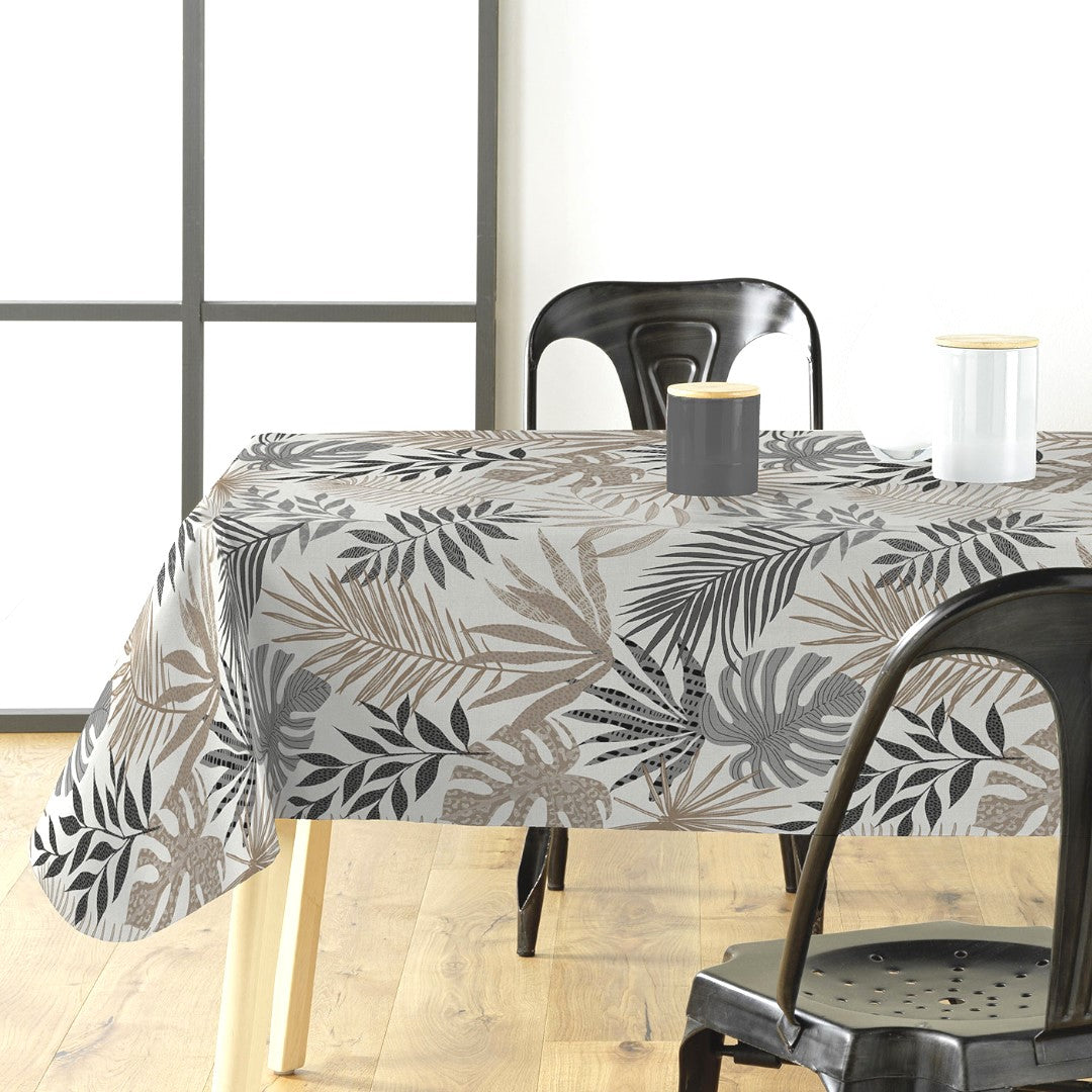 Gardenia Wachstuch Tischdecke mit tropischen Blättern auf dem Tisch