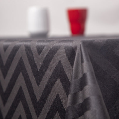 Elegante abwaschbare Tischdecke mit gewebtem grafischem Muster