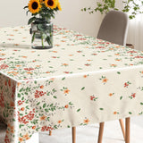 Flora Sand – Geprägte Wachstuch Tischdecke mit Blumenbordüre, Ambiente 1