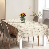 Flora Sand – Geprägte Wachstuch Tischdecke mit Blumenbordüre, Ambiente 2