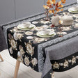 Floria Schwarz – Dekorative Wachstuch Tischdecke mit Blumenbordüre, Ende