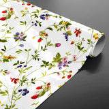 Lydia Sommerbær - Wachstuch Tischdecke mit wilden Beeren und Blumen in fröhlichen Farben, gerollt