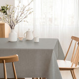 Nagore Gris – Abwaschbare Tischdecke mit klassischem Fischgrätmuster, Ecke