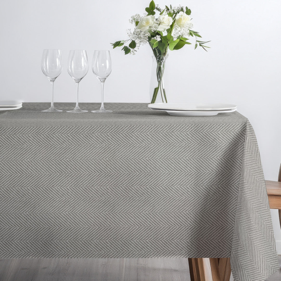 Nagore Gris – Abwaschbare Tischdecke mit klassischem Fischgrätmuster, Seite