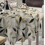 Nordfavn Class Beige - Runde Wachstuch Tischdecke mit grafischem Blattmuster im Ambiente