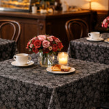 Petite Rose Schwarz – Wachstuch Tischdecke in Spitzenoptik mit kleinen Rosen, Caféambiente