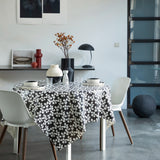 Poppy Graphite - Lola Wachstuch Tischdecke mit grafischem Blumendesign, Ambiente