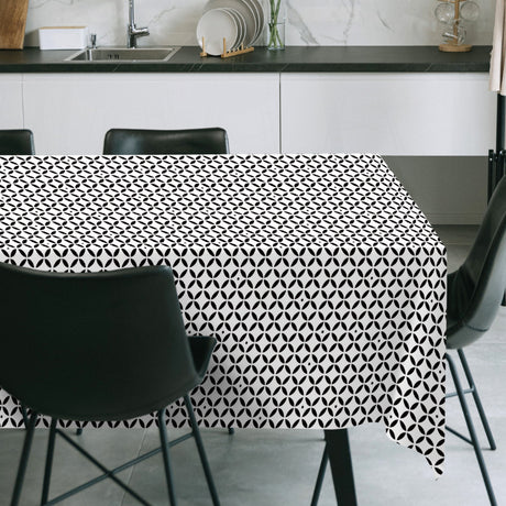 Raipur Black – Moderne schwarz-weiße Wachstuch Tischdecke mit grafischem Muster