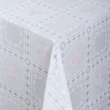 Rose Trellis – Wachstuch Tischdecke in Spitzenoptik mit rosa Rosenfeldern