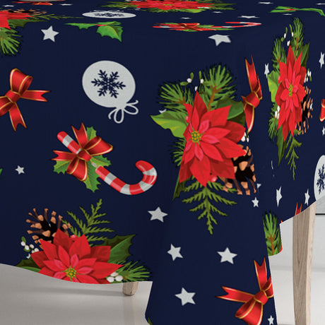 Nahaufnahme einer Ecke der Wachstuch Tischdecke Blaues Winterfest mit Weihnachtsmotiven
