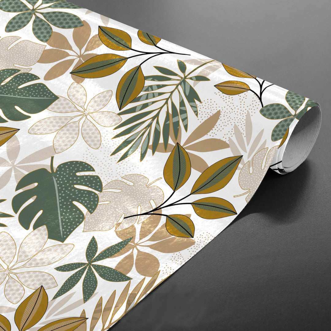 Aufgerollte Bruinelle Green Wachstuch Tischdecke mit Blättermuster in Grün und Beige