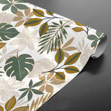 Aufgerollte Bruinelle Green Wachstuch Tischdecke mit Blättermuster in Grün und Beige