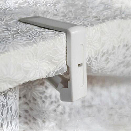 Tischdeckenklammern aus weißem Kunststoff