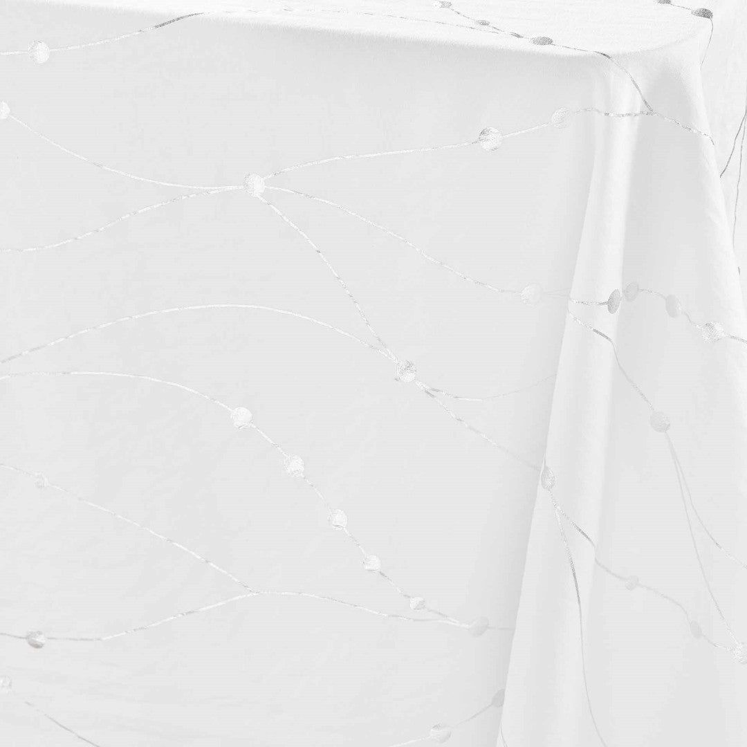 Nahaufnahme der Ecke der Firmament Metallic weißen Tischdecke mit Silbersternen