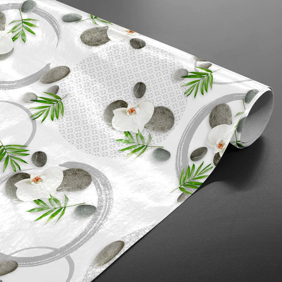 Gravity – Ruhige Wachstuch Tischdecke mit Orchideen und Steinen