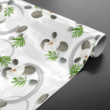 Gravity – Ruhige Wachstuch Tischdecke mit Orchideen und Steinen