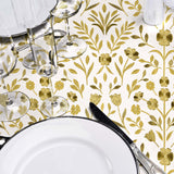 Tischdekoration mit Guldflor Wachstuch Tischdecke in Weiß und Gold