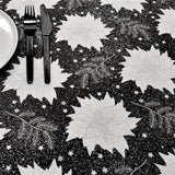 Weihnachtsstern Schwarz – Abwaschbare Weihnachtstischdecke mit Weihnachtssternen, Tannengrün und Glitzer, 155 cm breit