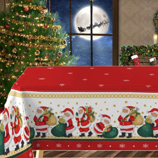 Weihnachtsmann mit Geschenken – rote Wachstuch Tischdecke für Weihnachten mit Weihnachtsmännern
