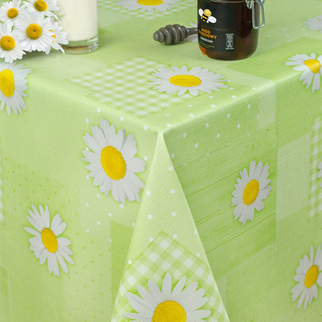 Margeriten und Patchwork – Runde Wachstischdecke mit Gummizug