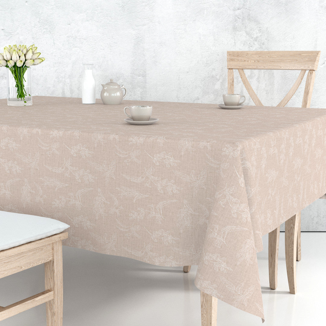Mesina Beige – Wachstuch Tischdecke in Leinenoptik mit Blattzeichnungen auf dem Tisch
