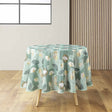 Natane Sage runde Tischdecke mit Blattmuster in Gold und Grau auf hellem Hintergrund
