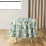 Natane Sage runde Tischdecke mit Blattmuster in Gold und Grau auf hellem Hintergrund