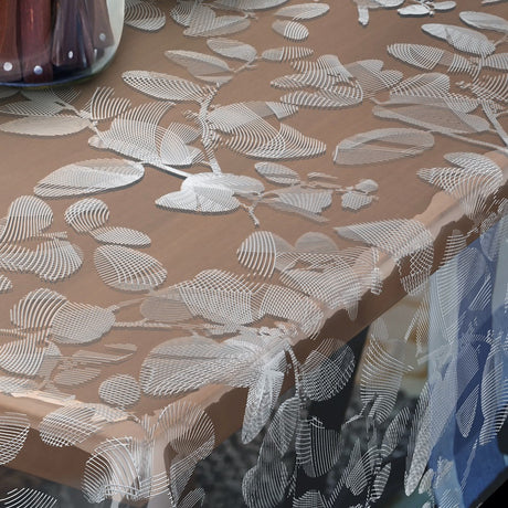 Sally, Tischfolie transparent mit weißem Linienblumenmuster