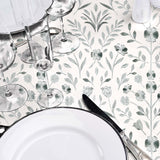 Tischdekoration mit Sølvflor Wachstuch Tischdecke und Silberblumen