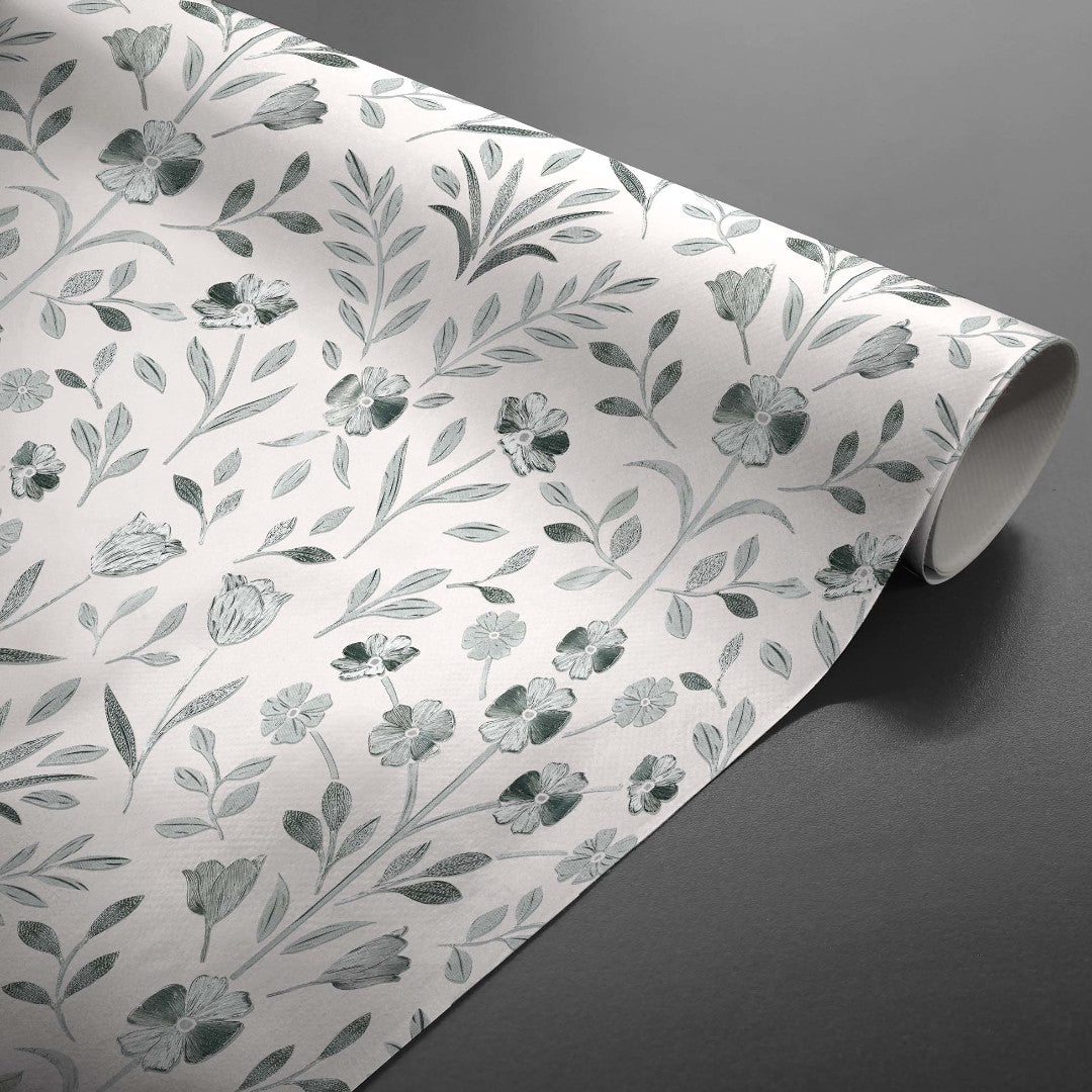 Gerollte Sølvflor Wachstuch Tischdecke mit silbergeprägten Blumen
