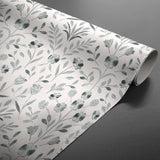 Gerollte Sølvflor Wachstuch Tischdecke mit silbergeprägten Blumen