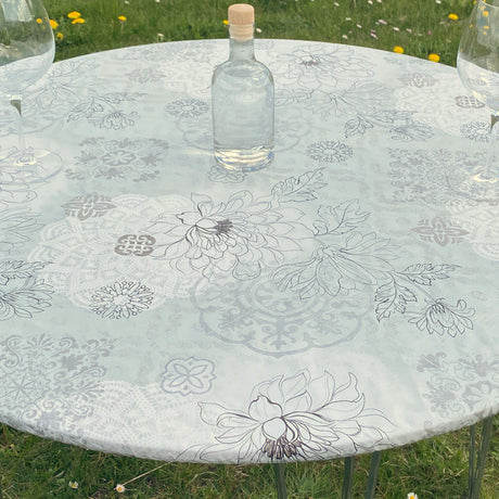 Schöne Blumen im Linienmuster in hellen Farben - Runde Wachstischdecke mit Gummizug