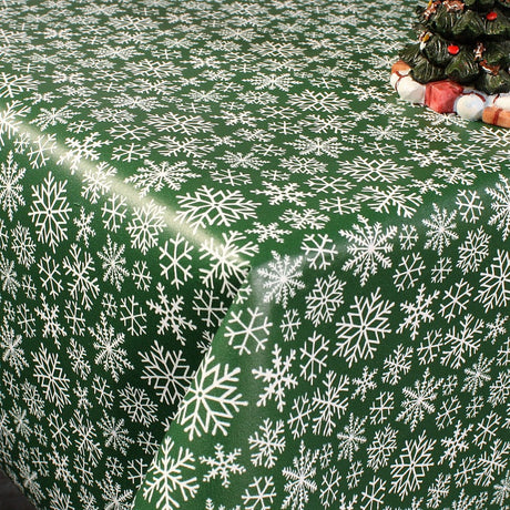 Trend Weihnachtstischdecke – Schneeflocken dunkelgrün