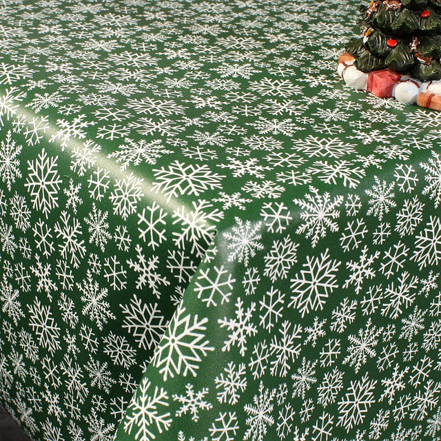 Trend Weihnachtstischdecke – Schneeflocken dunkelgrün