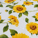 Wachstuch Tischdecke mit Sonnenblumen, Musterbild zeigt wasserfeste Oberfläche