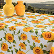 Sonnenblumen - Wachstuch Tischdecke in Gelb- und Orangetönen auf weißem Grund